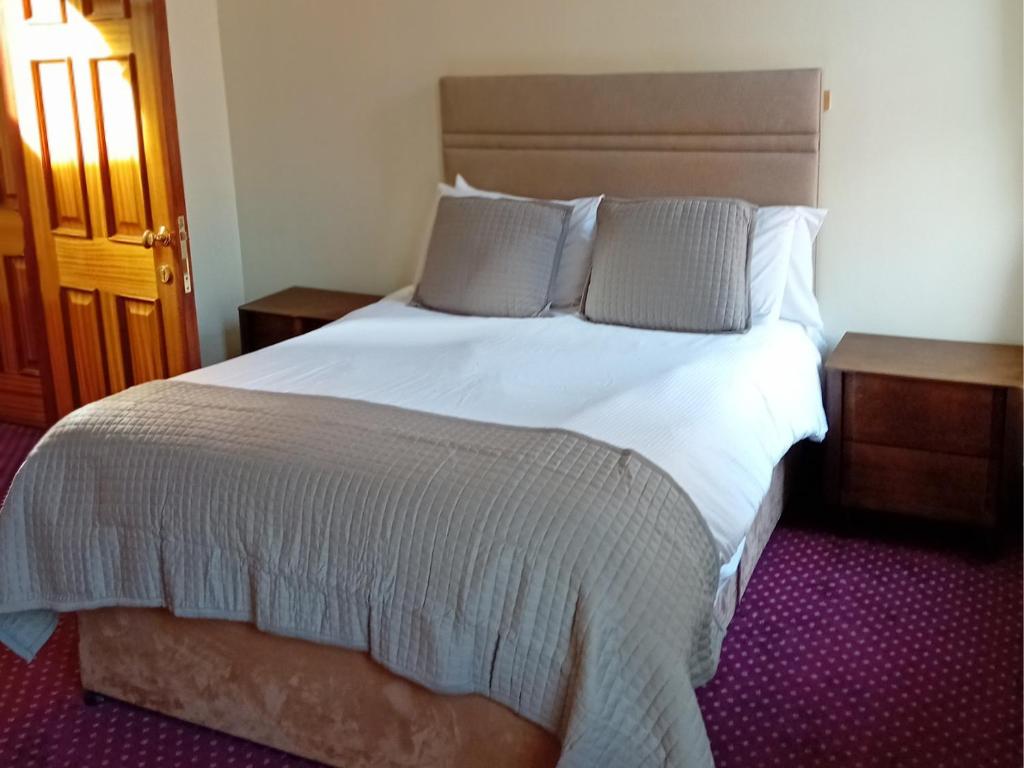 Cama ou camas em um quarto em O'Donoghue's