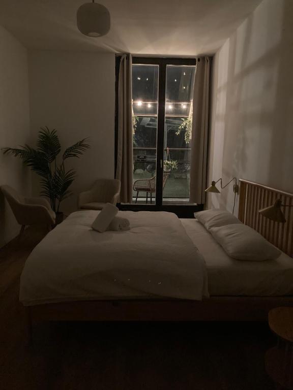 Postel nebo postele na pokoji v ubytování Minimal Hostel Kreuzberg