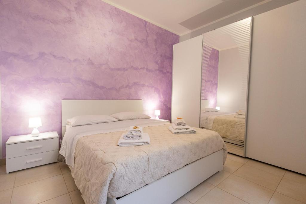 Postel nebo postele na pokoji v ubytování Sale di Sicilia Apartment