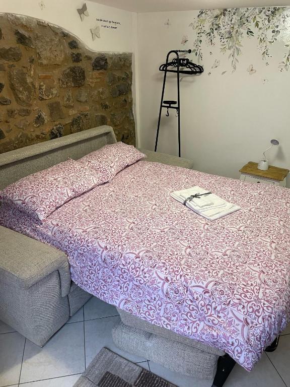 Postel nebo postele na pokoji v ubytování A casa di Peppetto