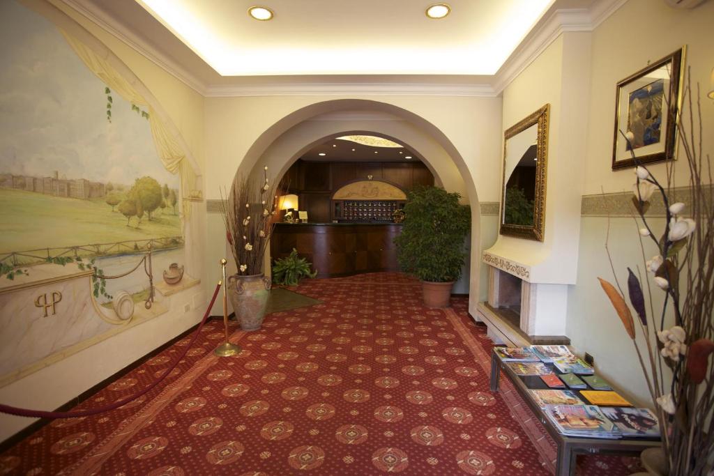 TV a/nebo společenská místnost v ubytování Hotel Parco Dei Principi