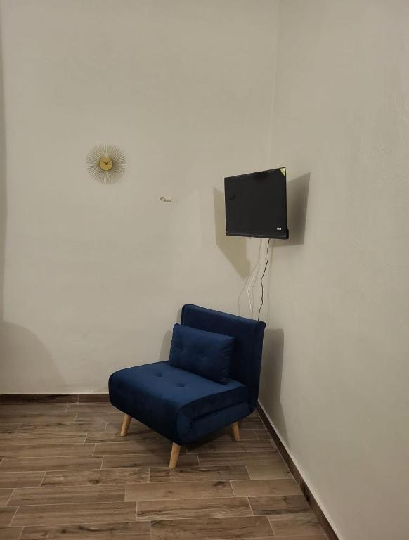 TV a/nebo společenská místnost v ubytování Dolce Dormire