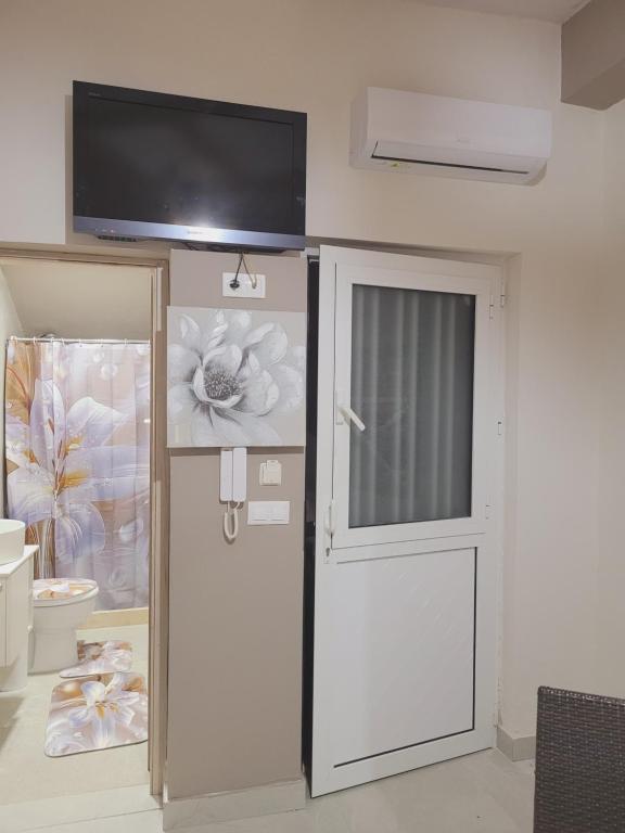 TV a/nebo společenská místnost v ubytování Sebastian Luxury House