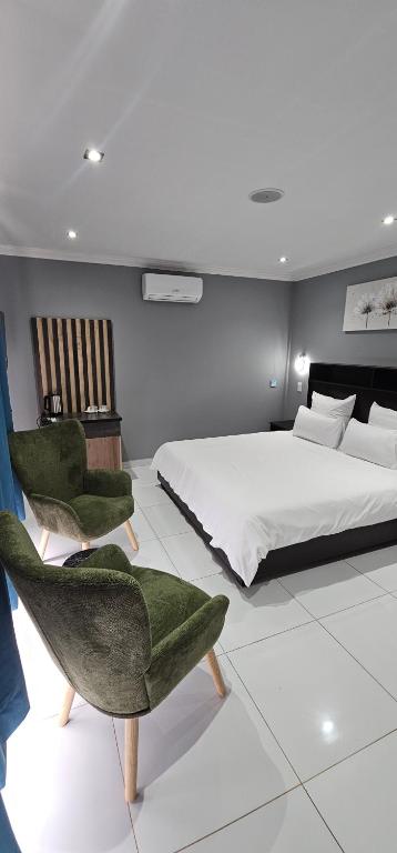 Postel nebo postele na pokoji v ubytování Grand Diamond Lodge