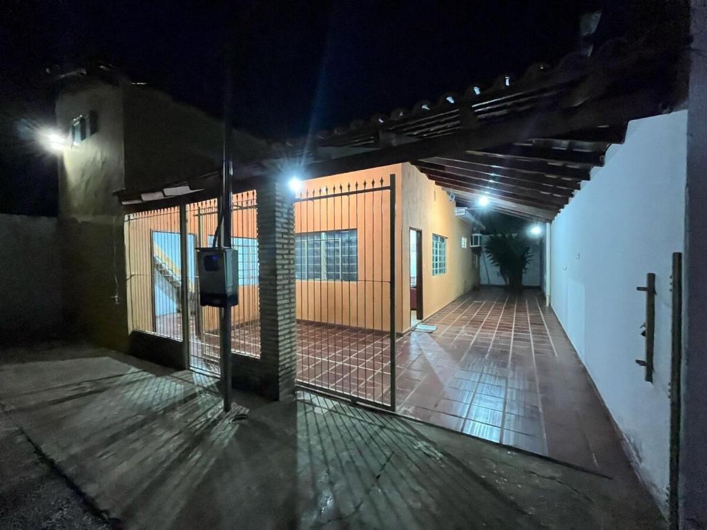 an empty hallway of a building at night at Casa da Vila 3 in Cáceres