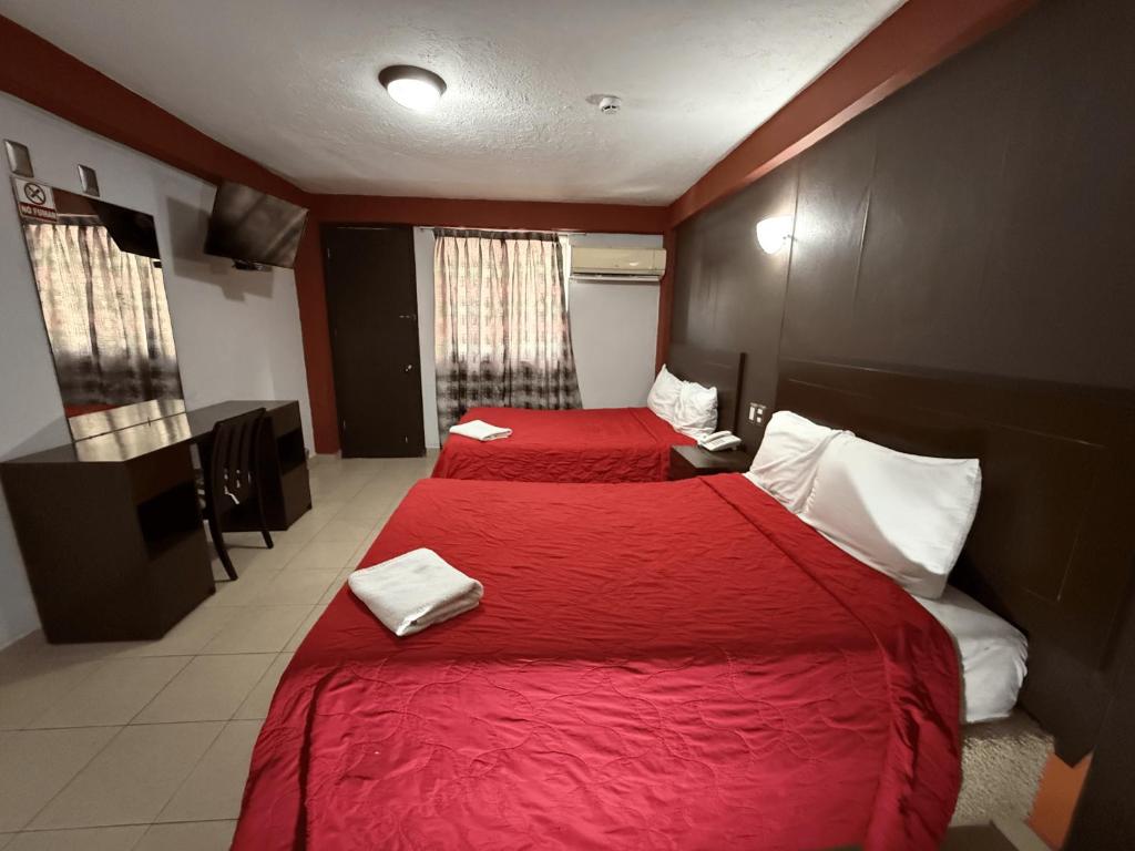 Postel nebo postele na pokoji v ubytování Hotel ROLOVI