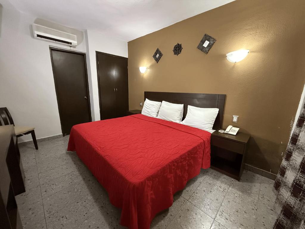 Postel nebo postele na pokoji v ubytování Hotel ROLOVI