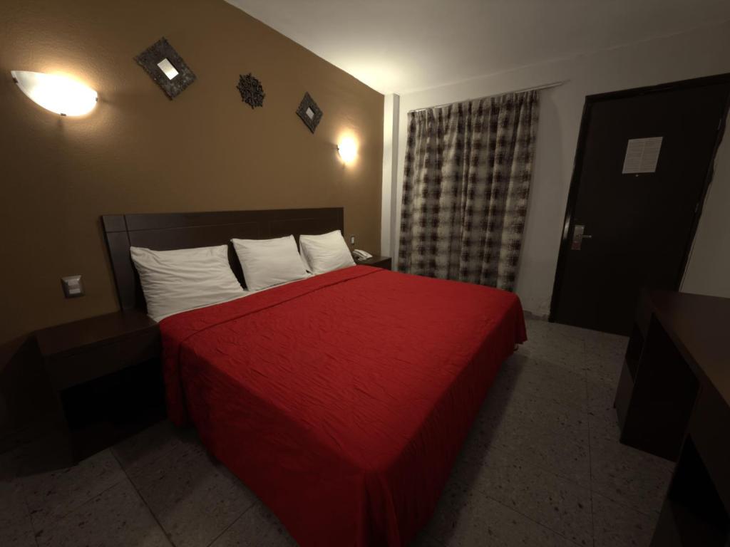 Postel nebo postele na pokoji v ubytování Hotel ROLOVI