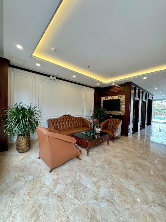 TV a/nebo společenská místnost v ubytování Luxury Hanoi Hotel