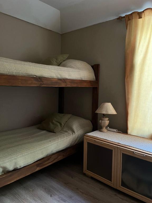 Postel nebo postele na pokoji v ubytování Le Baobab