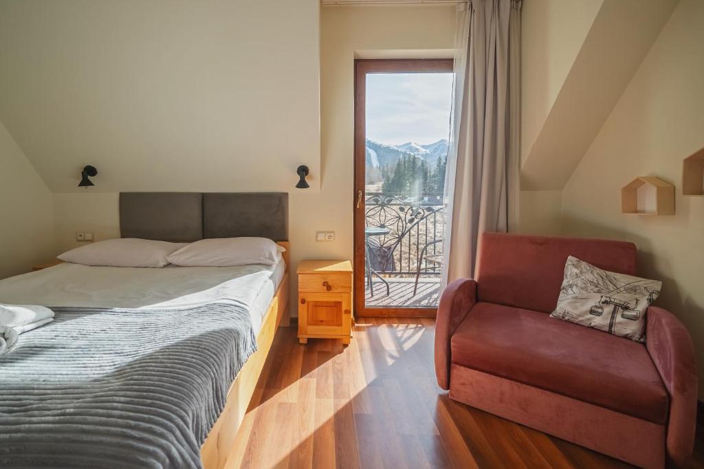 Posteľ alebo postele v izbe v ubytovaní Tatry Panorama