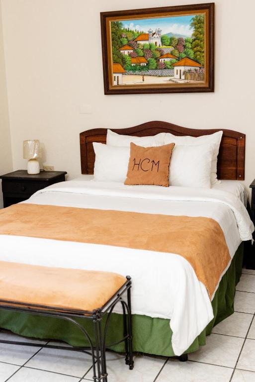 Postel nebo postele na pokoji v ubytování Hotel Camino Maya