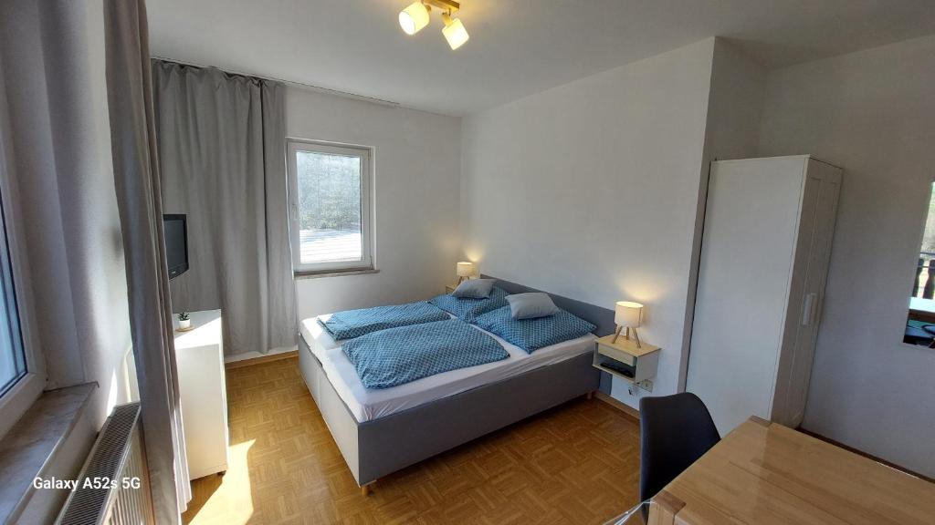 Postel nebo postele na pokoji v ubytování Bergwald