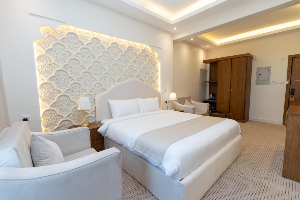 Postel nebo postele na pokoji v ubytování فندق أفين- Avene Hotel