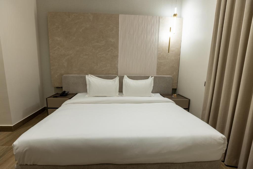 a large white bed in a hotel room at فندق ليورا Liora Hotel in Riyadh