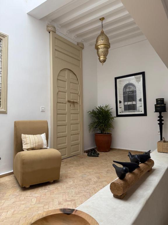 Posezení v ubytování Riad À l'ombre des Orangers