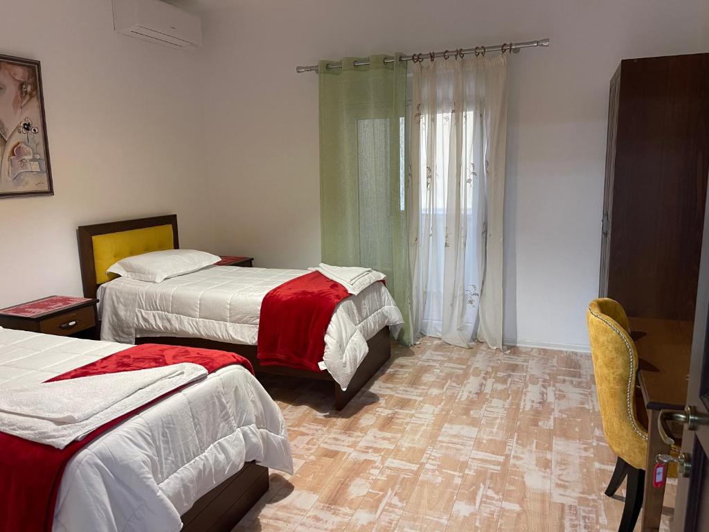 Ein Bett oder Betten in einem Zimmer der Unterkunft Hotel Vila C plus plus