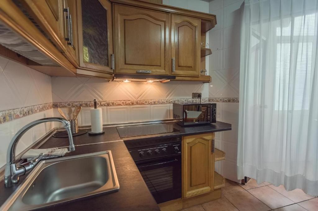 Kuchyň nebo kuchyňský kout v ubytování Apartamento turístico las aceitunillas