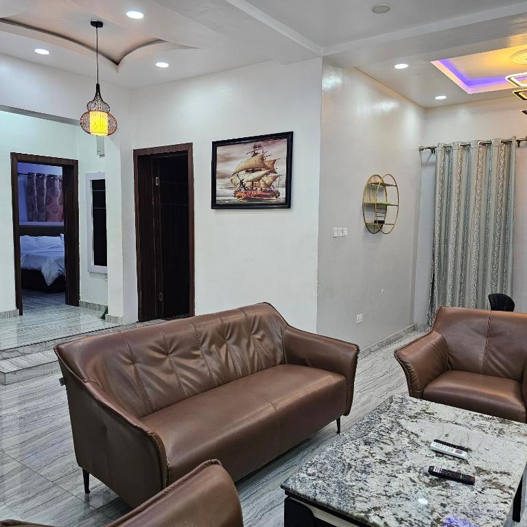 Posezení v ubytování Hen Cap Apartment Services