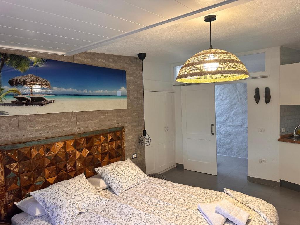 Postel nebo postele na pokoji v ubytování Apartamentos Finca Wapa