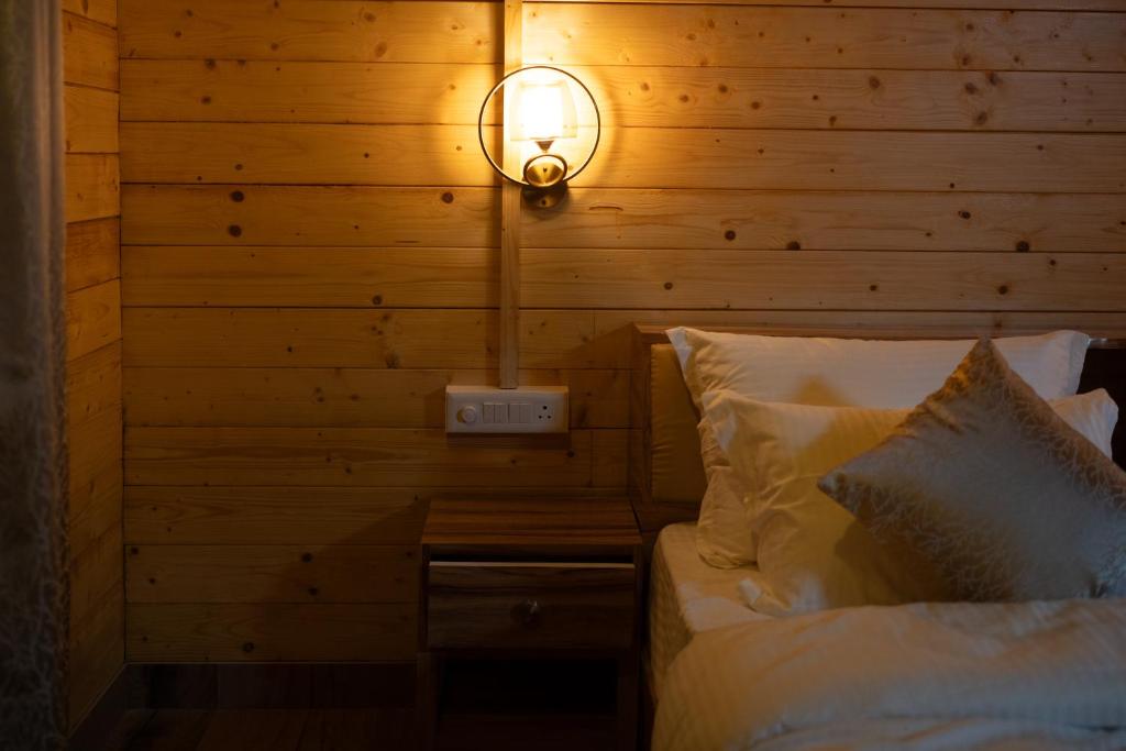 Postel nebo postele na pokoji v ubytování Mountail Eco Resort