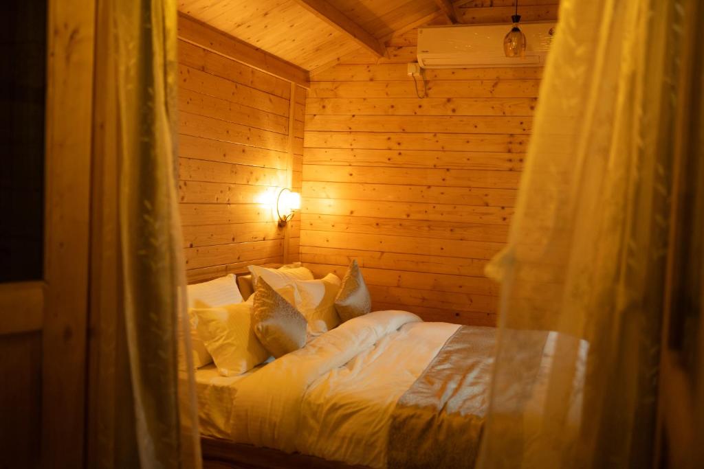 Postel nebo postele na pokoji v ubytování Mountail Eco Resort