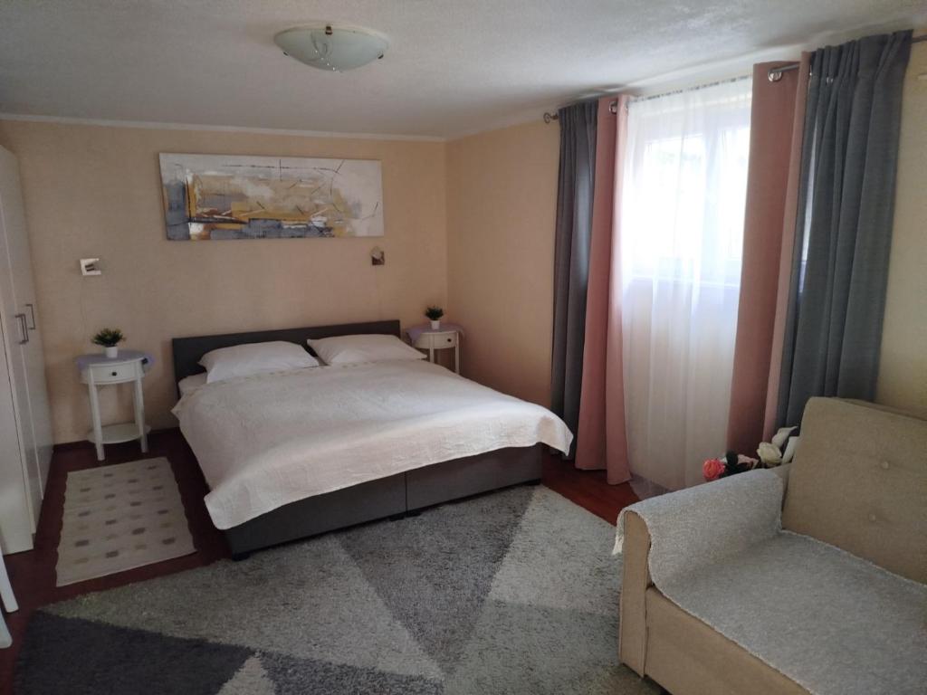 Postel nebo postele na pokoji v ubytování Apartman Tihana