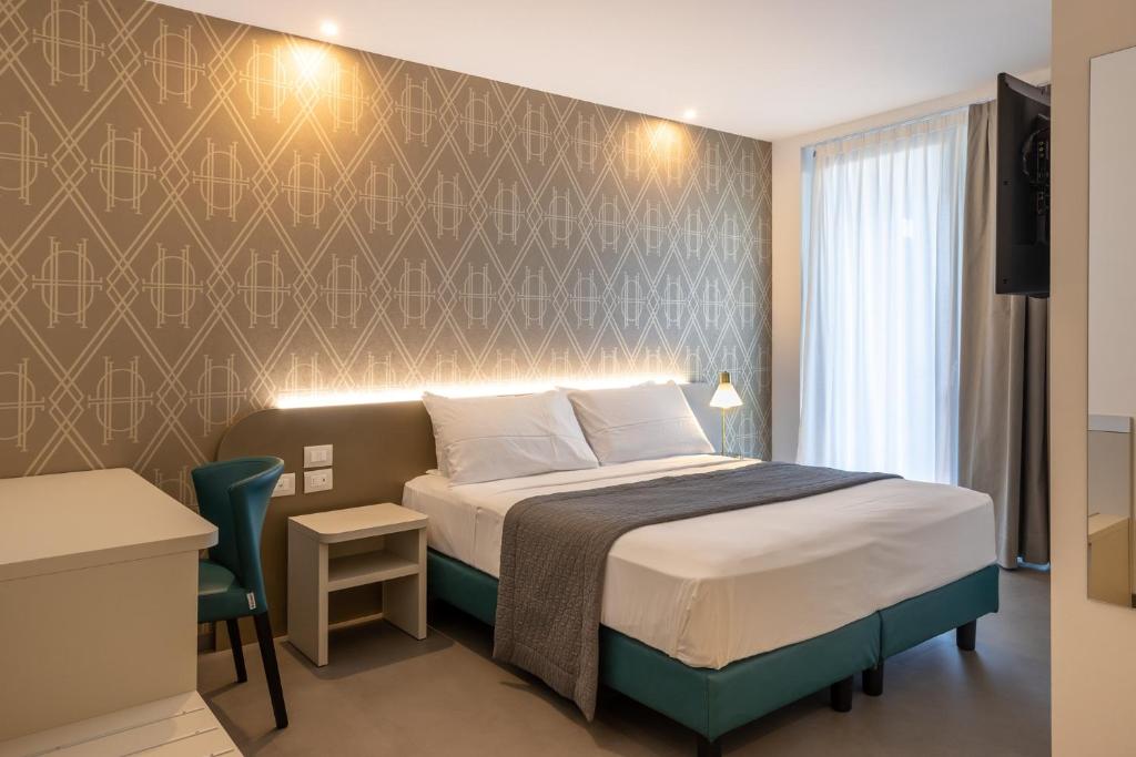 Postel nebo postele na pokoji v ubytování DIVA HOTEL LIGNANO - Adults Only