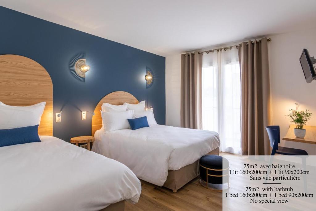 Un pat sau paturi într-o cameră la Hôtel Flor