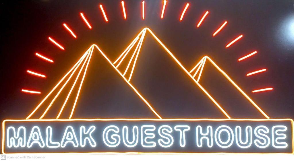 Certifikát, hodnocení, plakát nebo jiný dokument vystavený v ubytování Malak Guest House