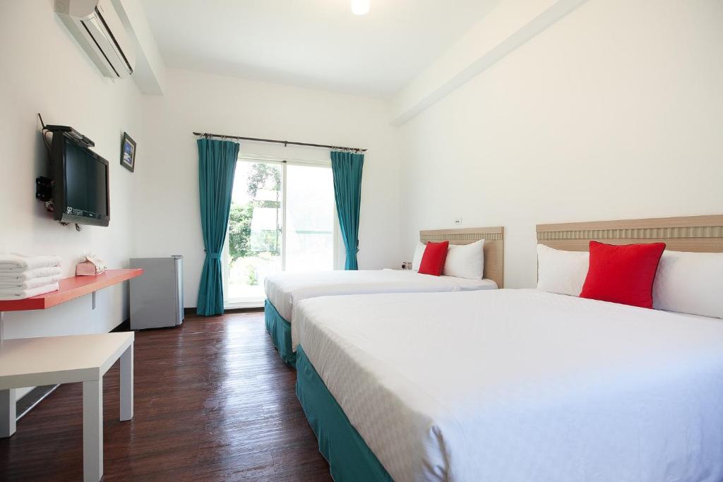 Postel nebo postele na pokoji v ubytování Otousann B&B
