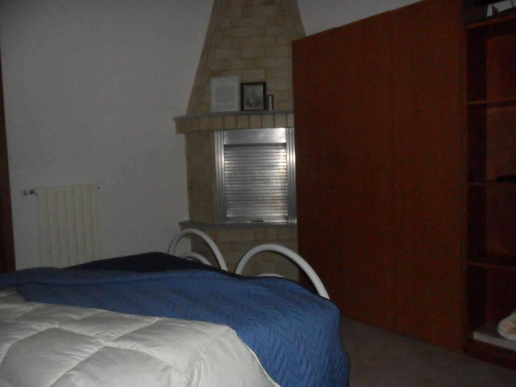 A bed or beds in a room at La Stanza Alternativa