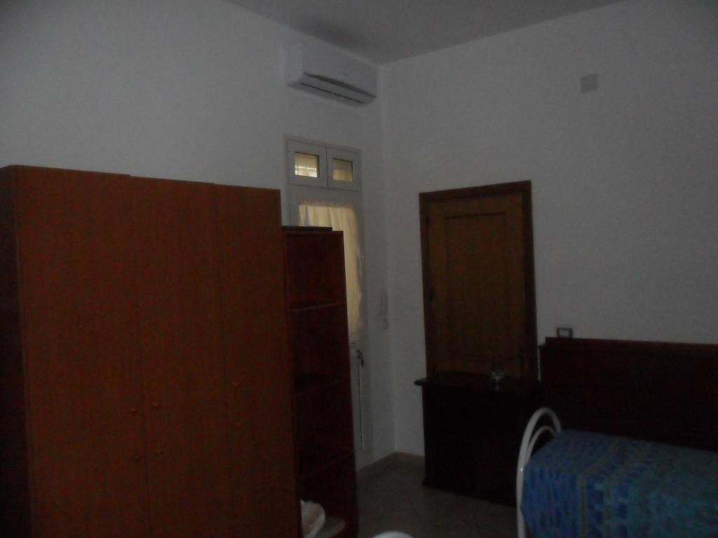 A bed or beds in a room at La Stanza Alternativa