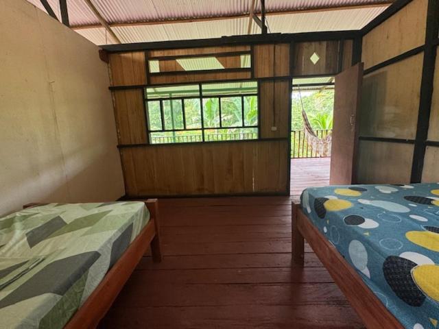 Postel nebo postele na pokoji v ubytování Amazon Renaco Lodge