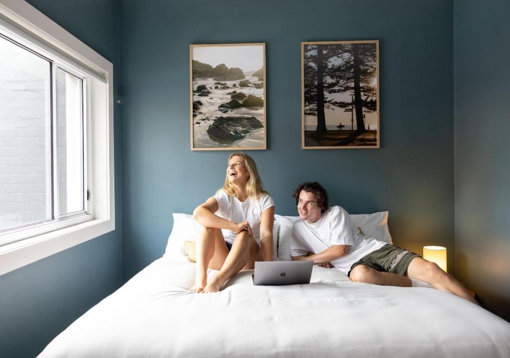 Postel nebo postele na pokoji v ubytování Stoke Beach House