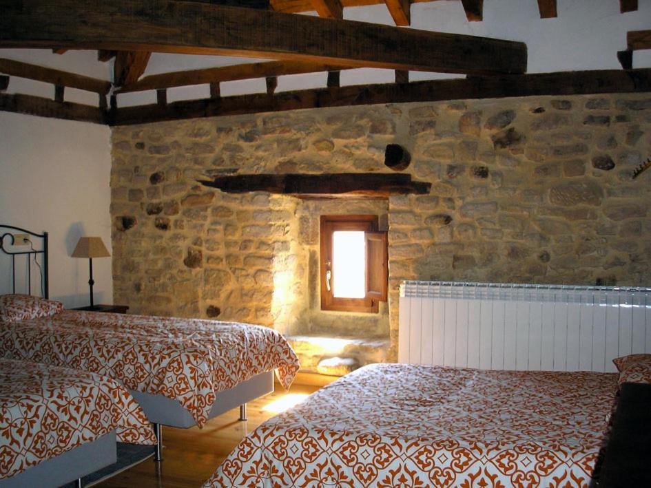 Postel nebo postele na pokoji v ubytování Don Baldomero Hotel Rural