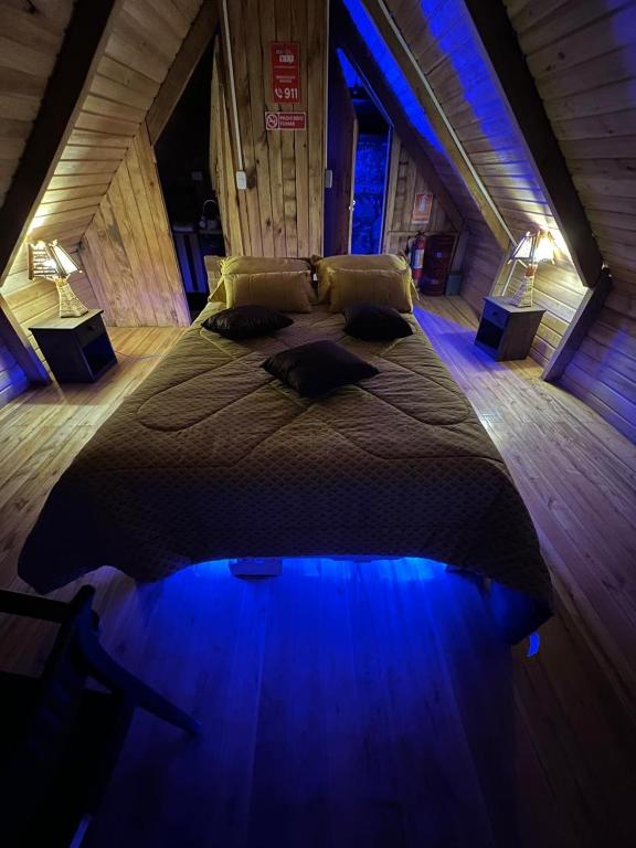 Postel nebo postele na pokoji v ubytování Cabañas-ALPINA-PATATE