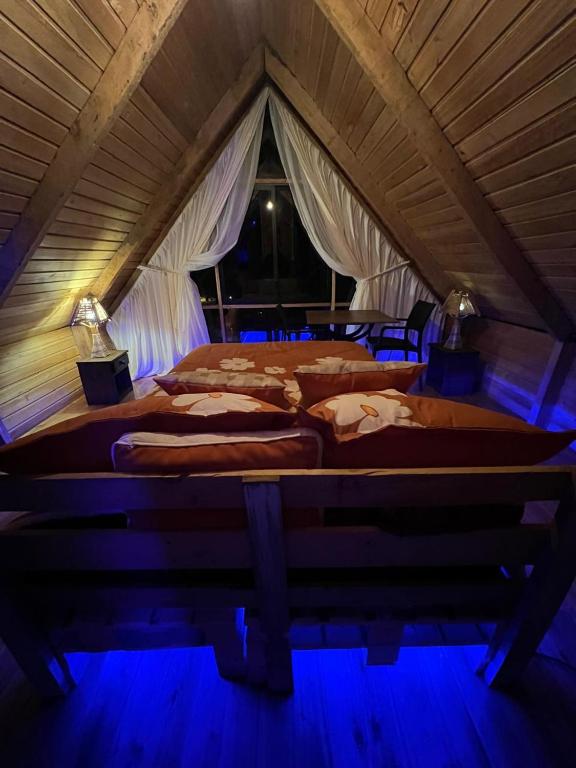 Postel nebo postele na pokoji v ubytování Cabañas-ALPINA-PATATE