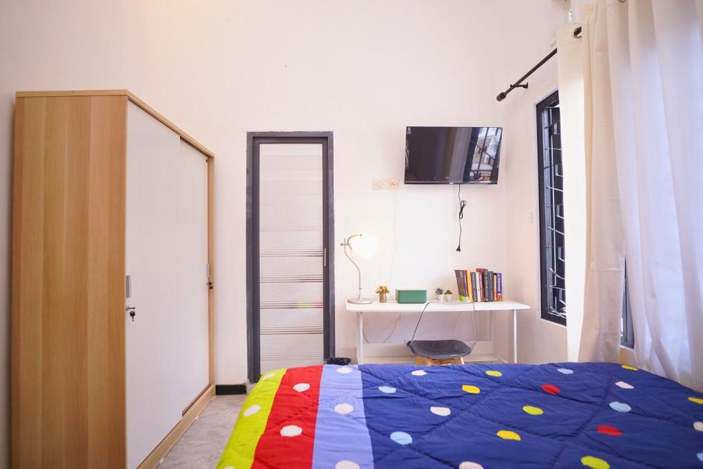 Postel nebo postele na pokoji v ubytování Casa de Vie Homestay