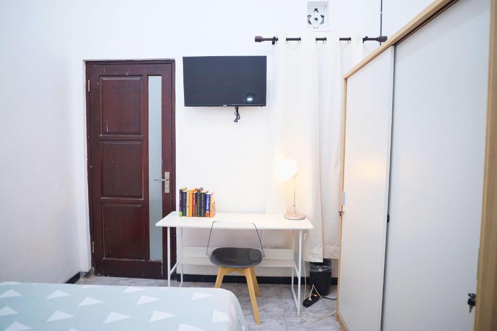 TV a/nebo společenská místnost v ubytování Casa de Vie Homestay