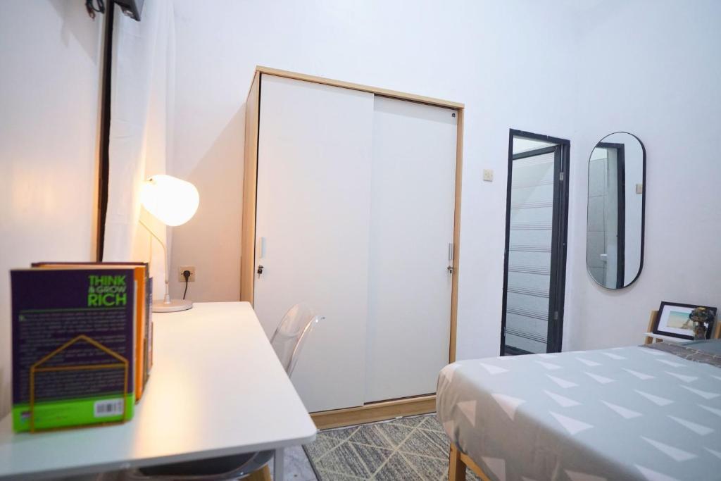 Postel nebo postele na pokoji v ubytování Casa de Vie Homestay