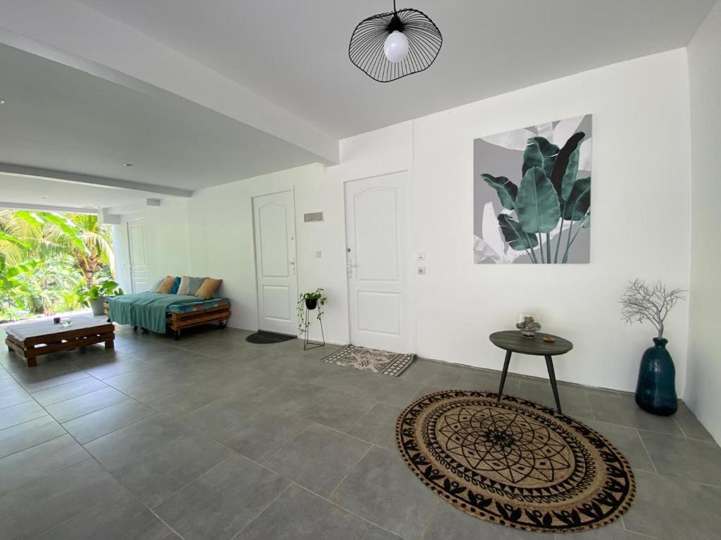 Posezení v ubytování Chambre double bas de Villa