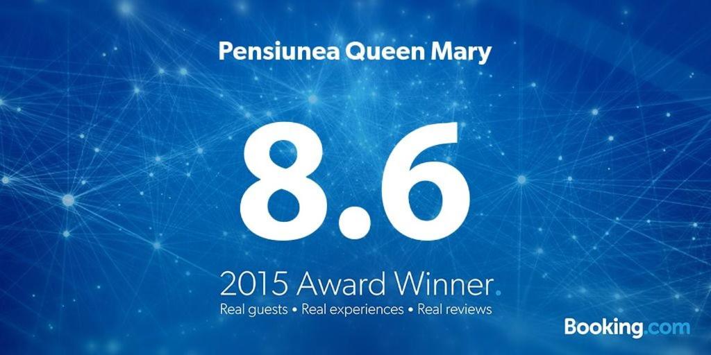 a poster with the number eight in white on a blue background at Pensiunea Queen Mary in Sînpetru