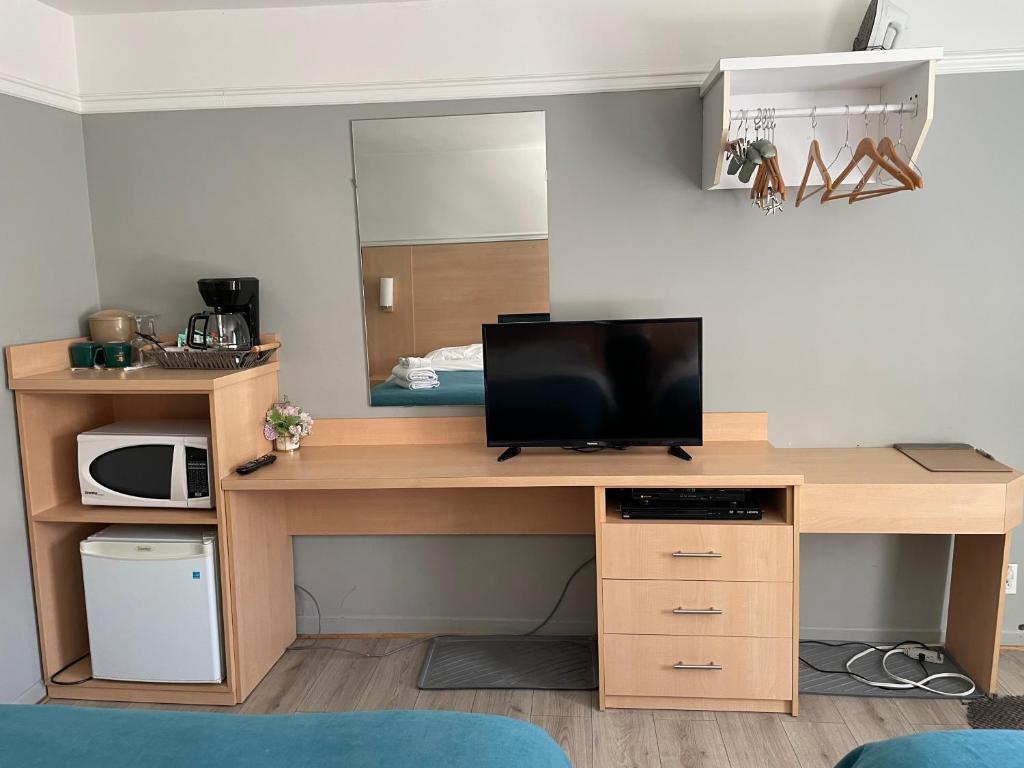 Kuchyň nebo kuchyňský kout v ubytování Motel au P'tit Sapin