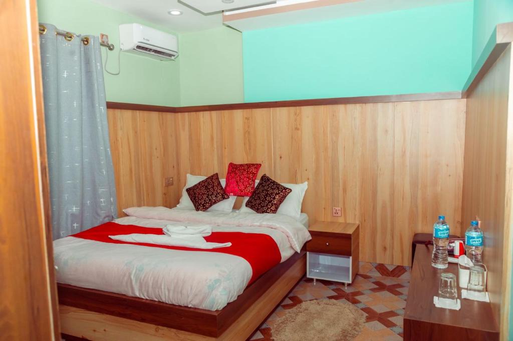 Voodi või voodid majutusasutuse Hotel Old Darbar toas