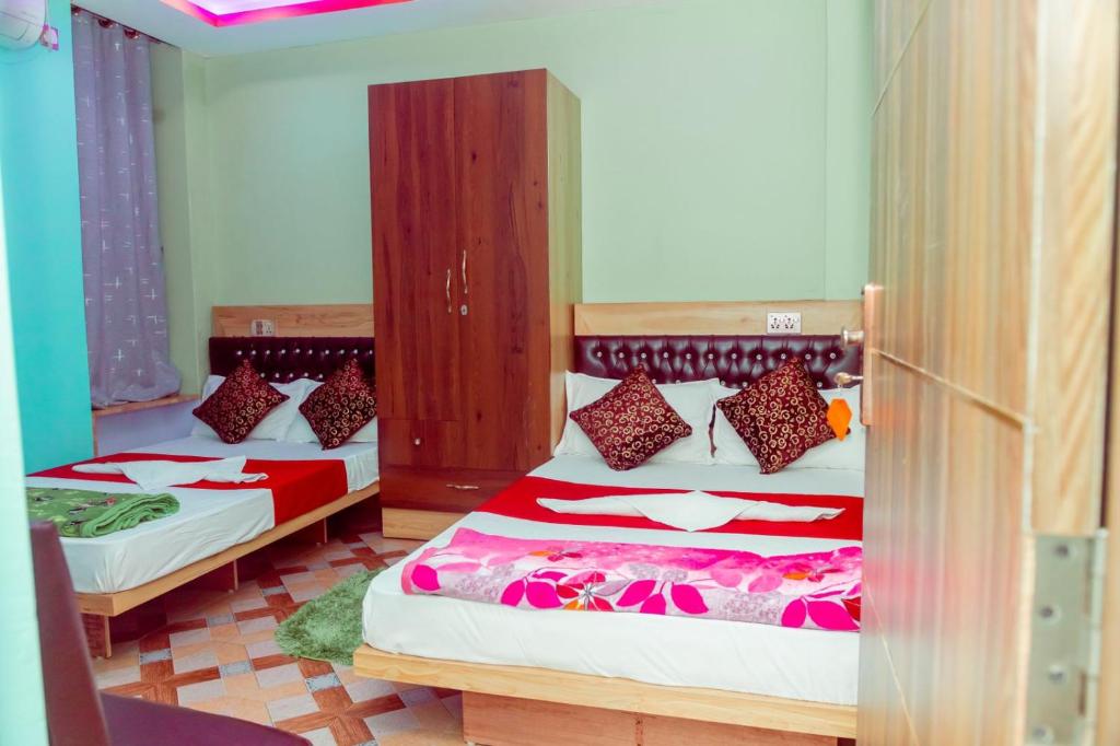 Voodi või voodid majutusasutuse Hotel Old Darbar toas