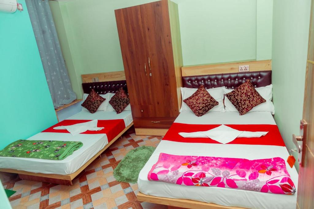 Voodi või voodid majutusasutuse Hotel Old Darbar toas