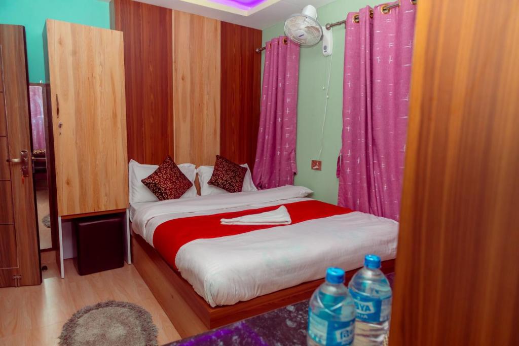 Voodi või voodid majutusasutuse Hotel Old Darbar toas
