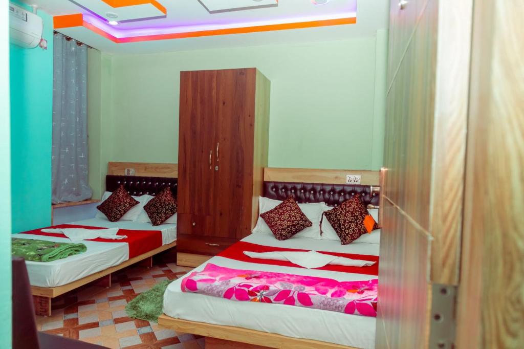 Voodi või voodid majutusasutuse Hotel Old Darbar toas