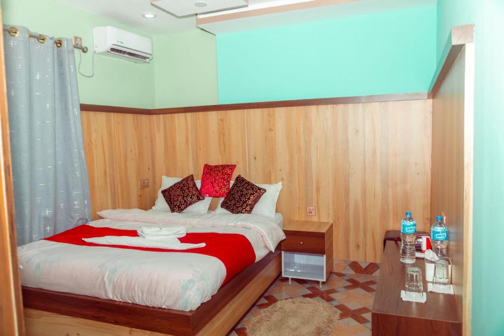Voodi või voodid majutusasutuse Hotel Old Darbar toas